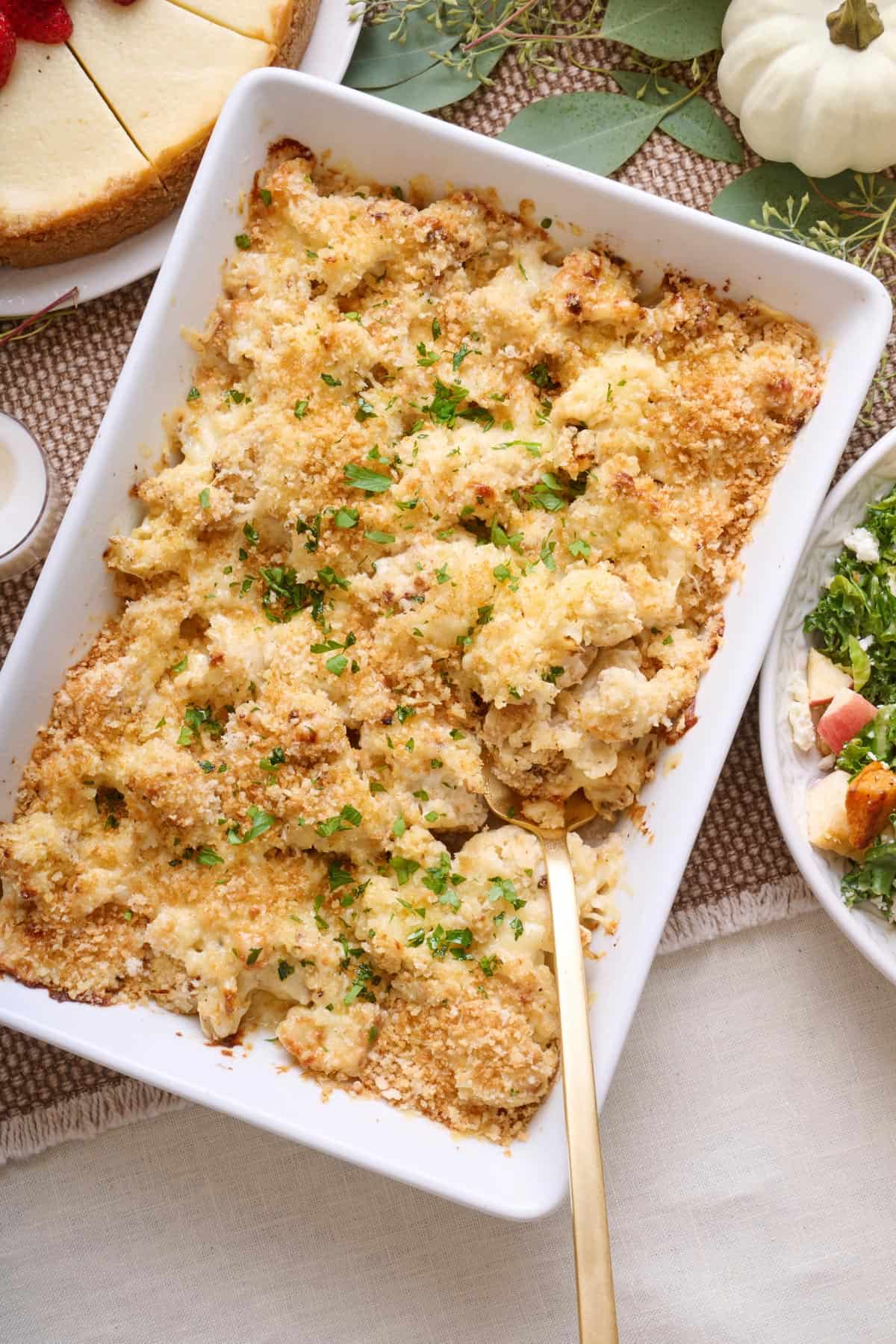 Baked cauliflower au gratin in a baking dish.