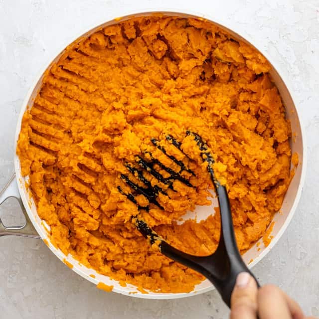 Fully mashed sweet potatoes.
