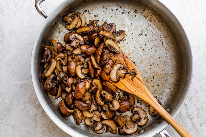 Showing how to caramelized mushrooms in a pan