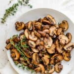 Serving plate of the sauteed mushrooms with thyme