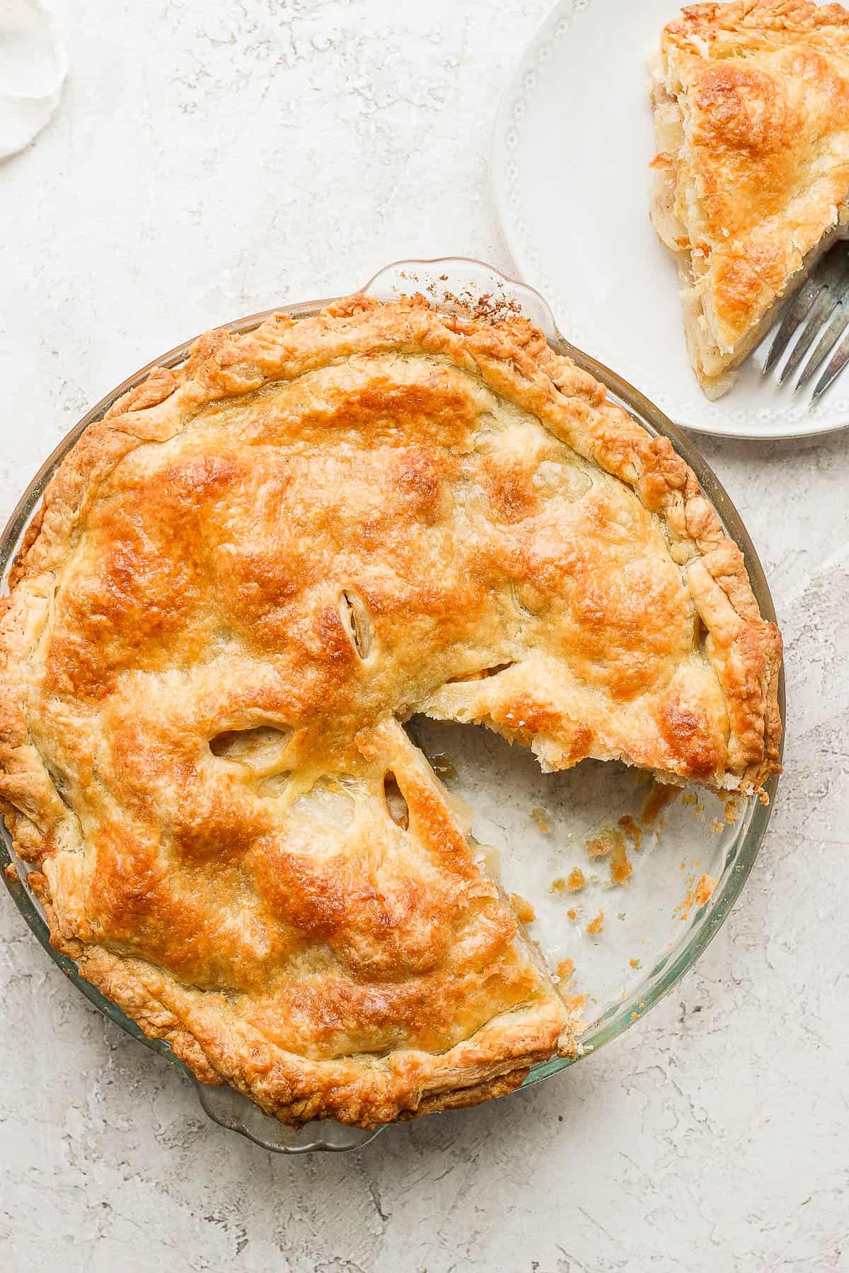 Cutting a slice of the pie with a serving spatula