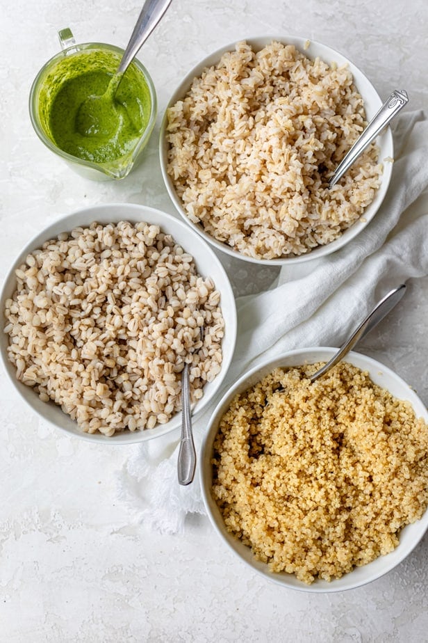 Bowls of rice, farro and quinoa