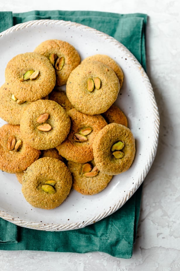 Pistachio cookies on a white plate - perfect for the holidays