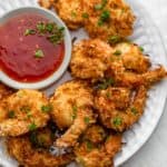 Air fryer coconut shrimp served with a sweet chili sauce