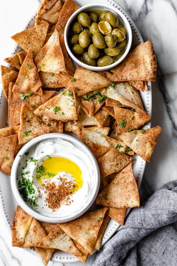 Platter of pita chips with labneh