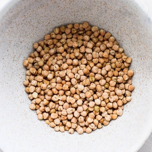 Dried chickpeas in a bowl.