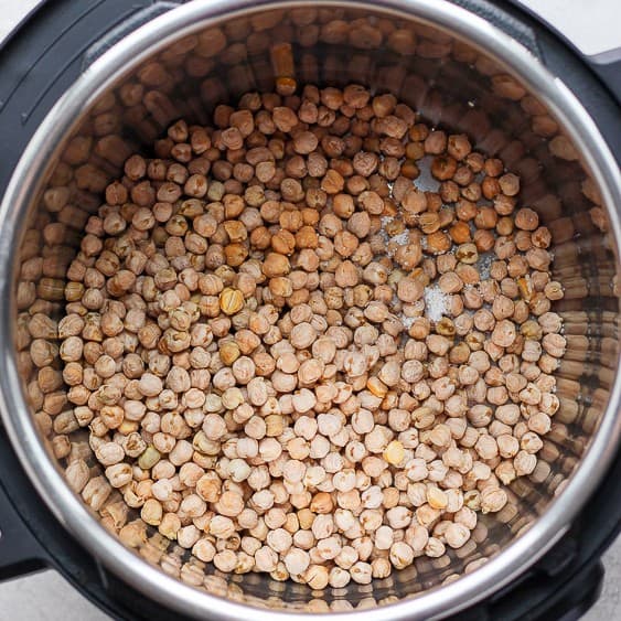 Dried chickpeas in pressure cooker.