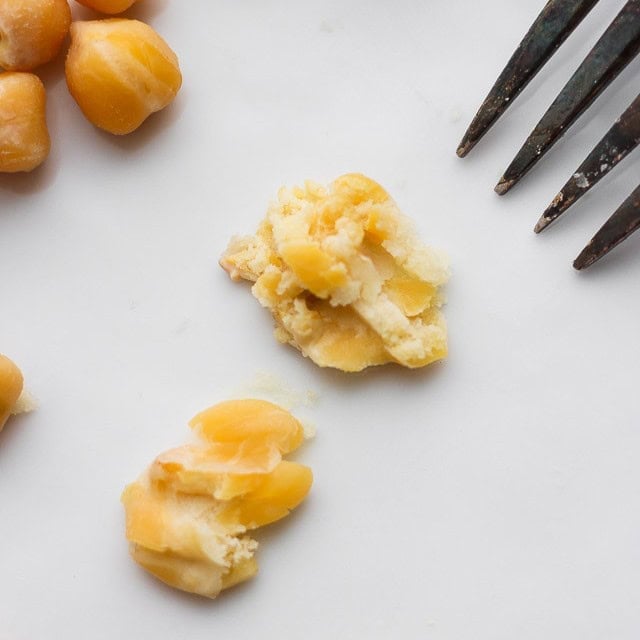 Smashed chickpea shows doneness.