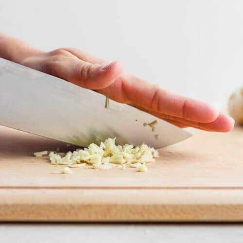 When using a garlic press, you do NOT need to peel the clove first