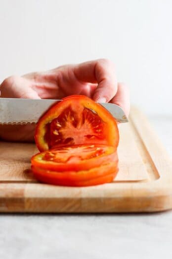 Cutting tomato into slices