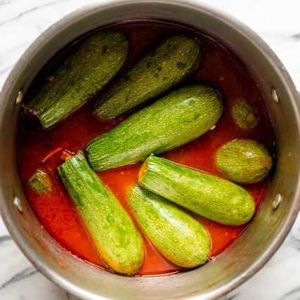 Squash added to the same pot as the broth.