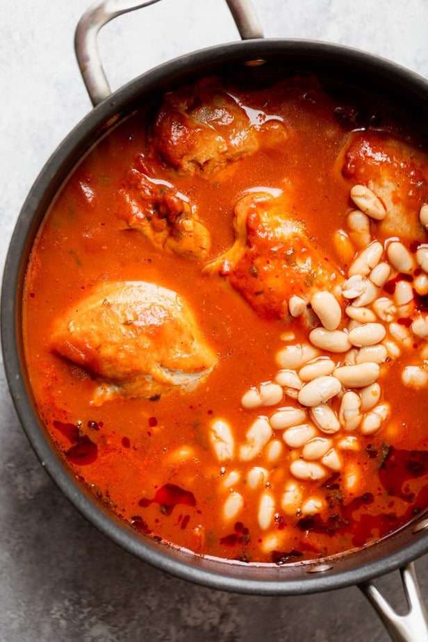 Beans and chicken added to the stew