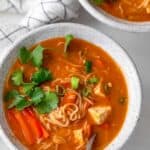 Red curry noodle soup bowl made with tofu