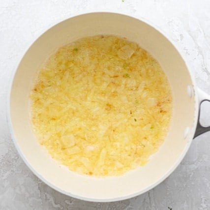 Cooked onions in a pot.