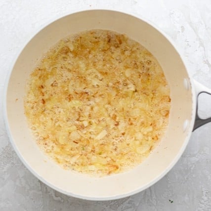 Garlic added to the pot.
