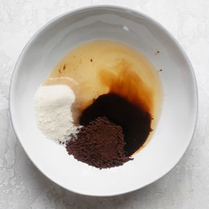 Ingredients to make whipped coffee in a bowl before mixing.