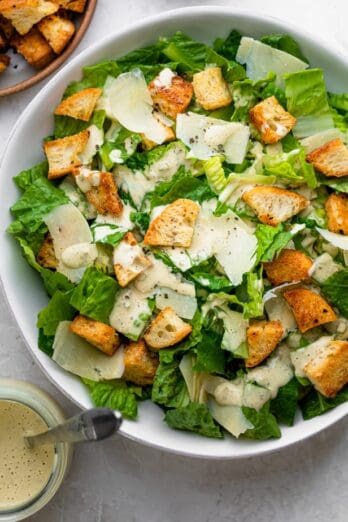 Caesar salad topped with the homemade dressing