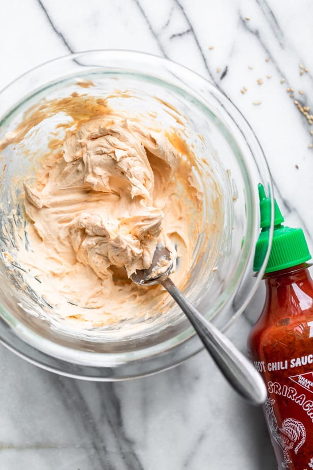 The cream cheese filling in a glass bowl