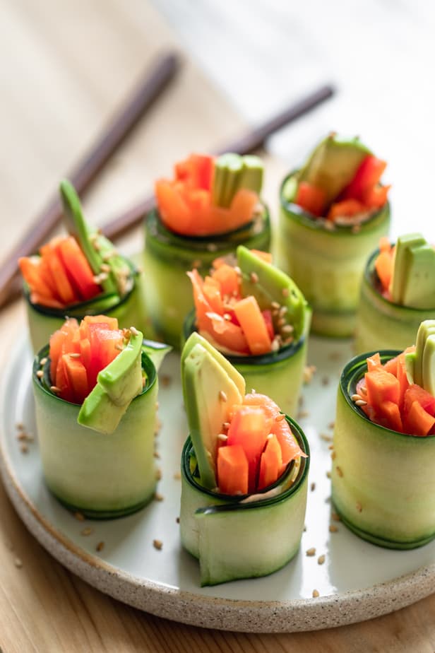 Cucumber Sushi Rolls standing on a plate to serve