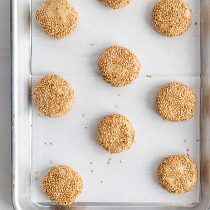 Honey tahini cookies on a baking sheet before baking.