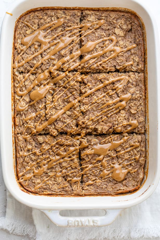 Peanut butter drizzled over the baked oatmeal