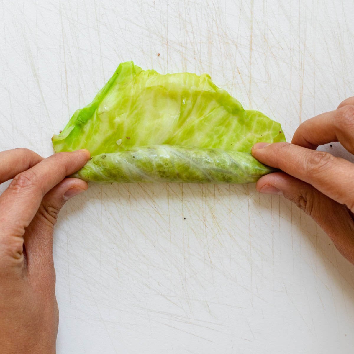 Finishing rolling the leaf.