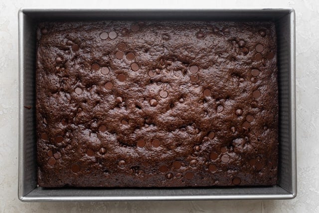 zucchini brownie uncut in a pan