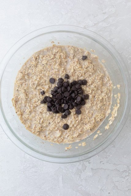 Banana oatmeal cup mixture in a large bowl.