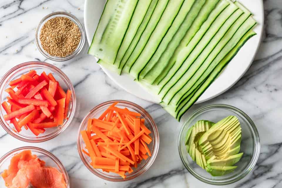 Ingredients to make cucumber roll sushi.