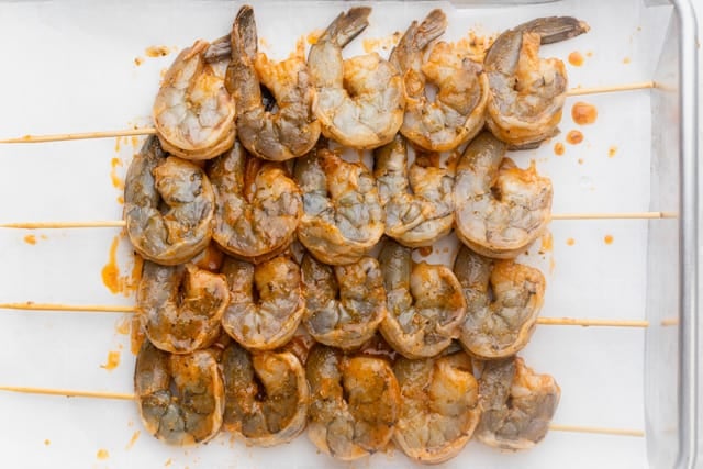 The shrimp on skewers before cooking