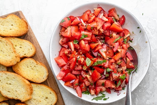 The tomato topping next to the toasted bread