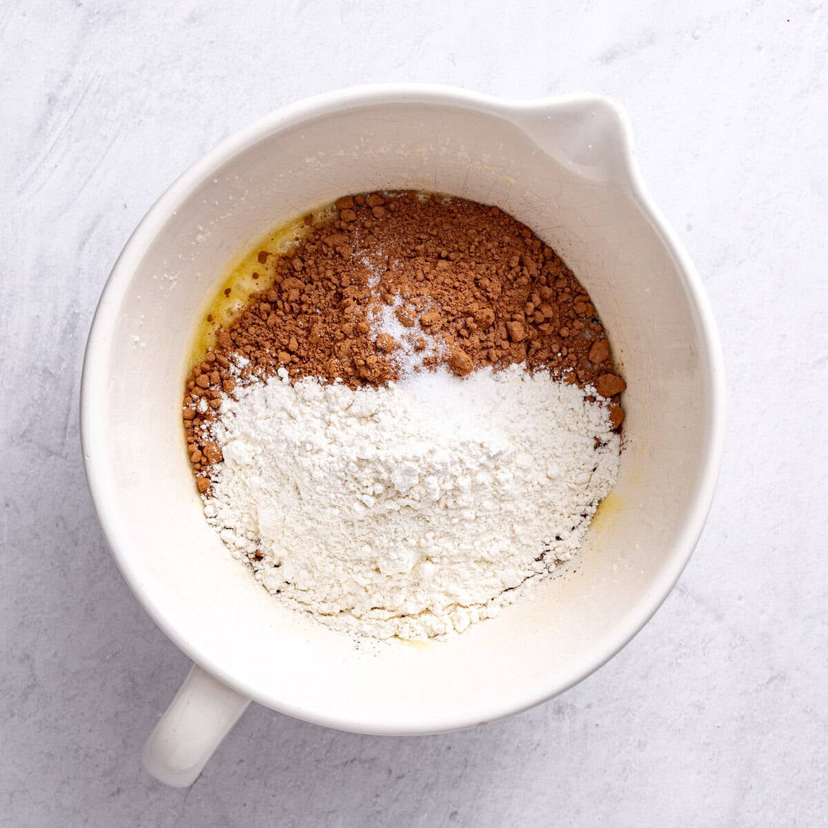After whisking with the cocoa powder, flour and salt added on top.