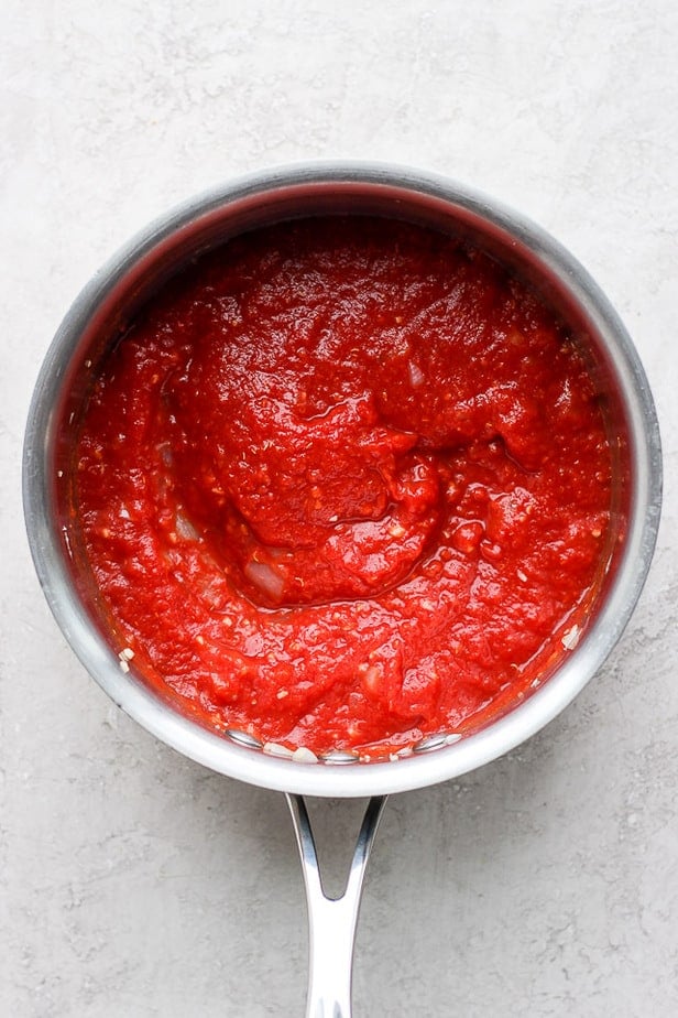 overhead shot of marinara sauce in a pot