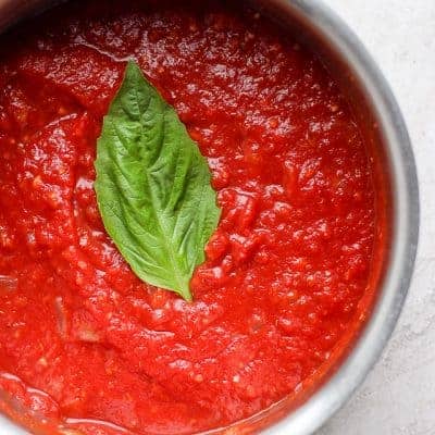 overhead shot of marinara sauce in a pot