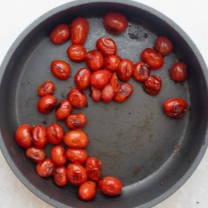 Tomatoes in a skillet.