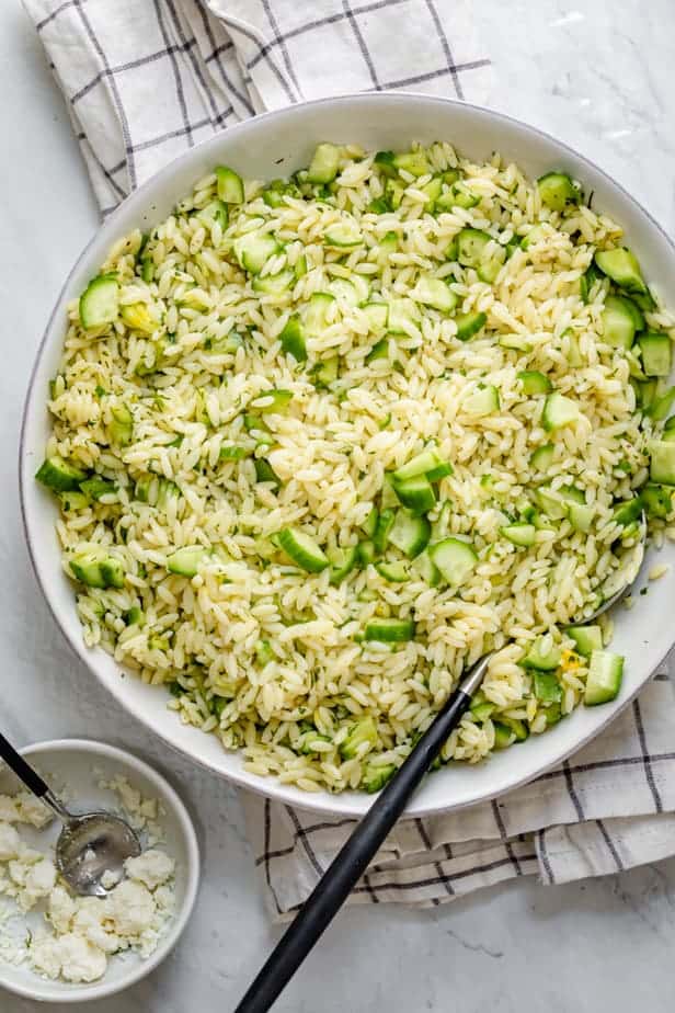 Large bowl of cucumber lemon orzo salad