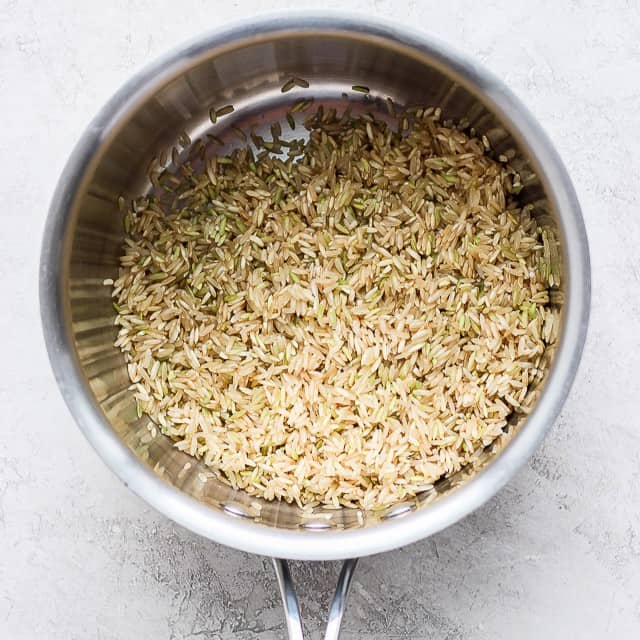 Washed rice in a pot.