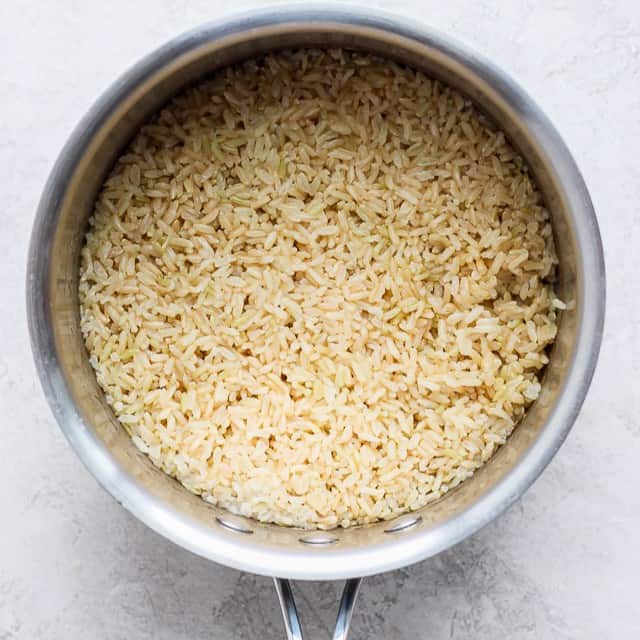 A pot of cooked brown rice.