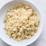 A bowl of cooked brown rice.