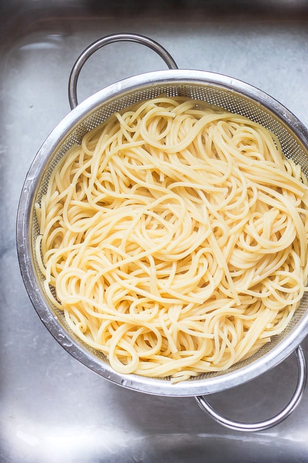 overhead shot of pasta in a colander