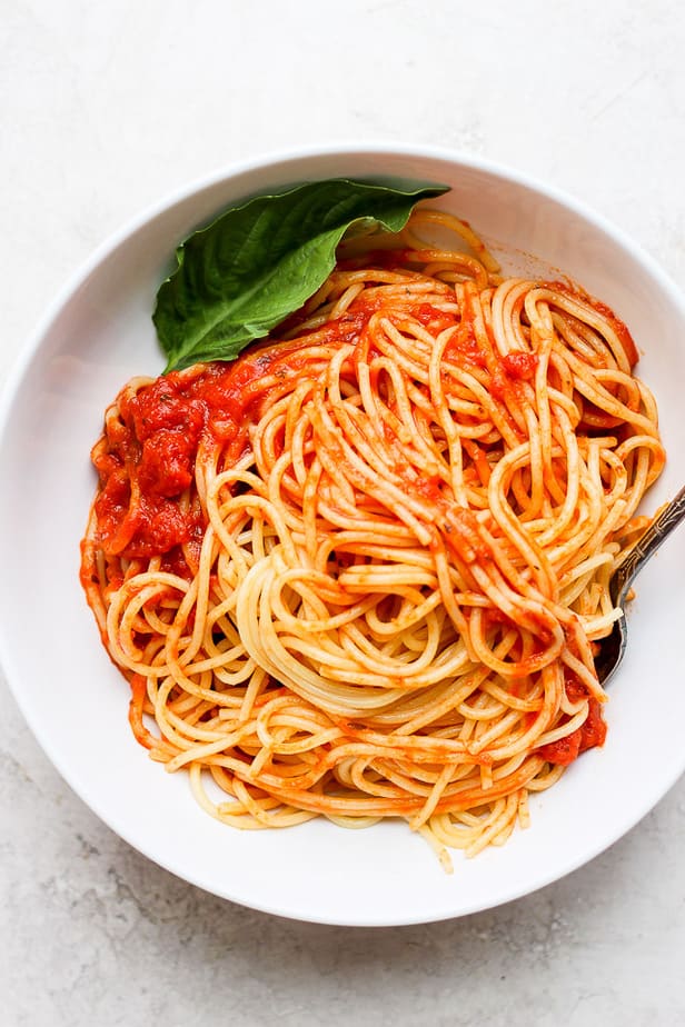 overhead shot of bowl of spaghetti and sauce
