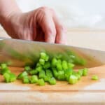 Cutting strips into smaller pieces.