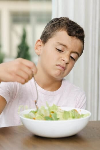 Yumna's son - making picky face about salad