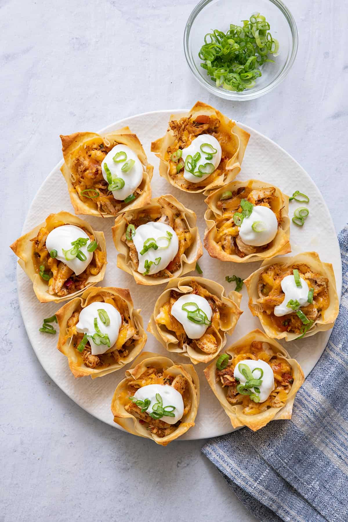 Chicken taco cups on platter.