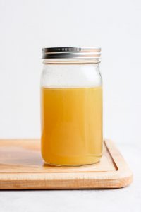 Cooled stock in a glass mason jar