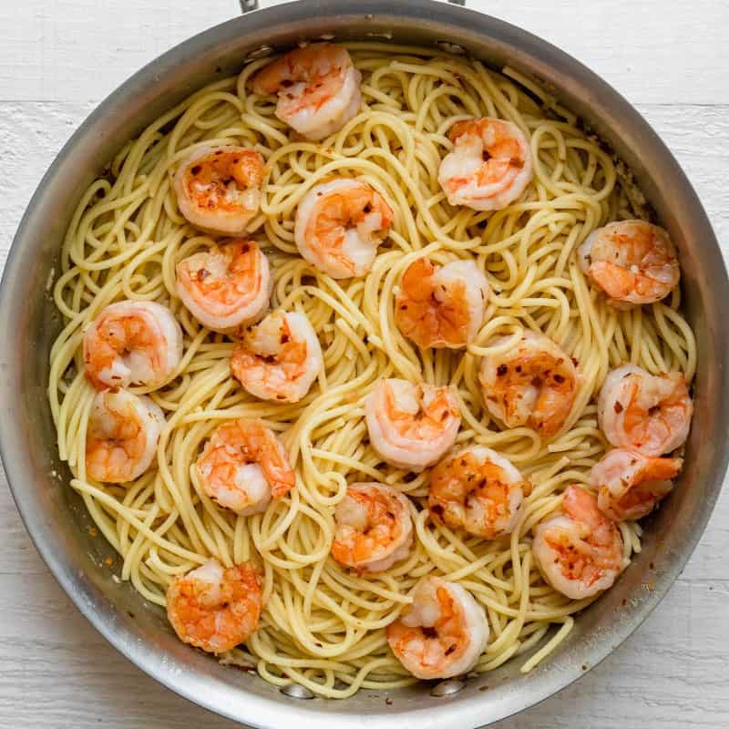 Shrimp added on top of the mixed garlic butter pasta.