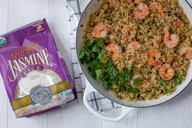 Final one pan shrimp and rice recipe next to bag of Lundberg rice