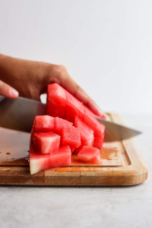 Slicing watermelon into cubes