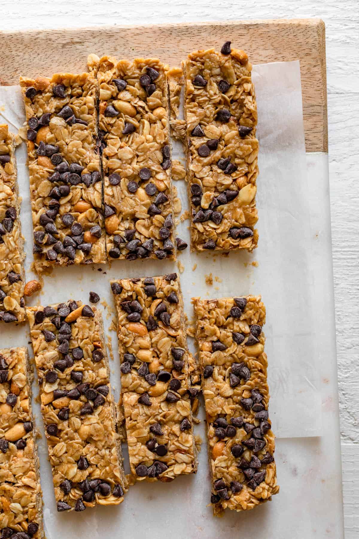 Chocolate Peanut Butter Granola Bars sliced on marble board