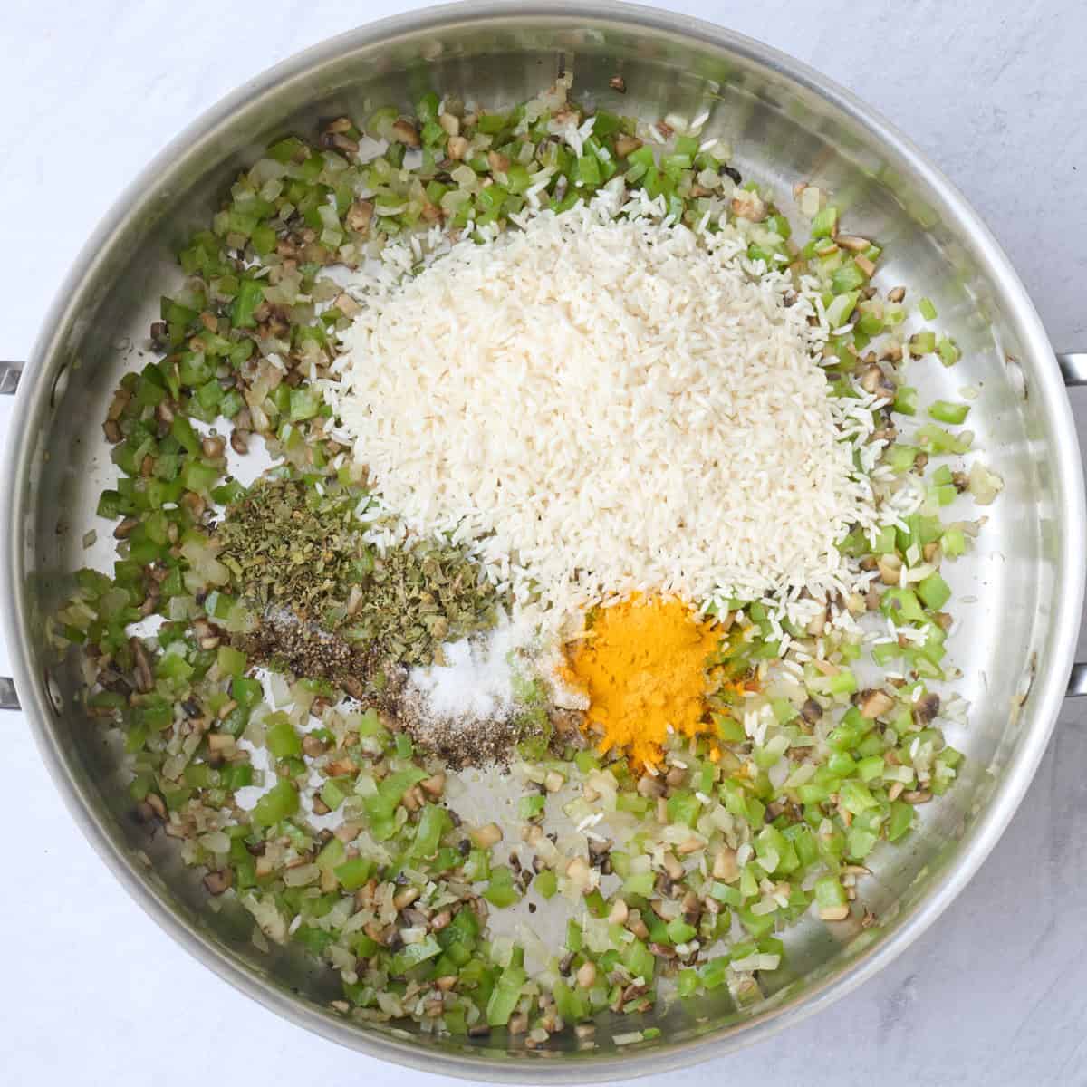Rice and seasonings added on top before combining.